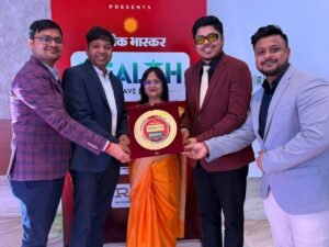 Dr. Ayush Dubey holding an award after recognition at a healthcare event.
